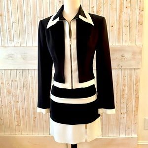 Managance skirt suit. Made in Paris! No flaws to note, pristine condition.